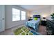 Bedroom with a bed, windows and colorful rug at 50 Sherwood Nw Ct # Sw50, Concord, NC 28027