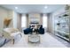 Cozy sitting area with plush blue seating, decorative pillows, and stylish decor at 50 Sherwood Nw Ct # Sw50, Concord, NC 28027