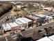 Birds eye view of commercial buildings with visible parking and nearby railway tracks at 527 Morrows Turnout Way, Pineville, NC 28134