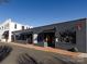 Commercial street featuring local businesses, including Carolina Scoops and Dick's Bicycle Repair Shop at 527 Morrows Turnout Way, Pineville, NC 28134