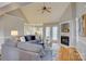 Cozy living room with vaulted ceiling, fireplace, and comfortable seating area at 5306 Club View Dr, Concord, NC 28025