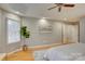Bright main bedroom boasting a ceiling fan, recessed lights, and a serene ambiance at 5306 Club View Dr, Concord, NC 28025