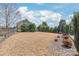 Expansive backyard showing off the potential to be an outdoor haven at 5608 Old Town Ln, Gastonia, NC 28056