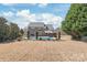 Large backyard with a swimming pool, patio, and plenty of room for outdoor activities at 5608 Old Town Ln, Gastonia, NC 28056