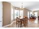 Charming breakfast nook with a chandelier and natural light near an open-concept living area at 5608 Old Town Ln, Gastonia, NC 28056