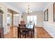 Dining room with hardwood floors, crown molding and wainscoting at 5608 Old Town Ln, Gastonia, NC 28056