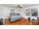 Bright bedroom with hardwood floors, neutral walls, and windows providing natural light at 810 Ashwood St, Kannapolis, NC 28081