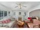 Warm and inviting living room with hardwood floors, fireplace, and ample natural light at 810 Ashwood St, Kannapolis, NC 28081