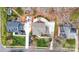Aerial view displaying the home's roof, landscaping, backyard, and driveway within the neighborhood at 8909 Abberley Ct, Huntersville, NC 28078