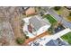 Aerial view of a home showcasing the property's layout, including the backyard and driveway at 8909 Abberley Ct, Huntersville, NC 28078