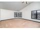 Vaulted ceiling bedroom with carpet, large windows, and natural lighting at 8909 Abberley Ct, Huntersville, NC 28078