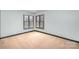 Cozy bedroom with carpeted floor and two windows, providing ample natural light at 8909 Abberley Ct, Huntersville, NC 28078