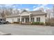 Charming single story building featuring well-manicured landscaping and ample parking at 8909 Abberley Ct, Huntersville, NC 28078