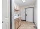 Functional laundry room with cabinets, sink, and ample storage space at 8909 Abberley Ct, Huntersville, NC 28078
