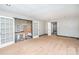 Cozy room with carpet flooring and double French doors leading to the foyer and other rooms at 8909 Abberley Ct, Huntersville, NC 28078