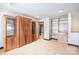 Spacious living room with custom built-in cabinets and shelving, offering ample storage at 8909 Abberley Ct, Huntersville, NC 28078