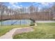 Tennis courts are surrounded by lush greenery, perfect for recreation at 8909 Abberley Ct, Huntersville, NC 28078