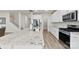 Bright, open kitchen featuring a large island, stainless steel appliances, and lots of storage at 916 Clementine Rd, Monroe, NC 28110