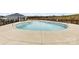 Community swimming pool with a concrete deck, safety features, and a Gathering-friendly atmosphere at 916 Clementine Rd, Monroe, NC 28110