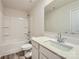 Clean bathroom with a tub and shower combination and modern fixtures at 10115 Chatham Run Ln, Charlotte, NC 28262