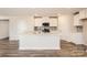 Spacious kitchen island with stainless steel sink and plenty of counter space at 10115 Chatham Run Ln, Charlotte, NC 28262