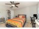 Bedroom with a ceiling fan, light walls, window, and desk/workstation at 105 Burlingame Ct # B, Mooresville, NC 28117
