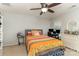 Bright bedroom with ceiling fan, large window, and cheerful bedding at 105 Burlingame Ct # B, Mooresville, NC 28117