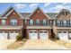 Charming brick townhouse with two-car garage and well-maintained landscaping at 105 Burlingame Ct # B, Mooresville, NC 28117
