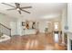 Spacious open-concept living room features hardwood floors and plenty of natural light at 105 Burlingame Ct # B, Mooresville, NC 28117