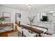 Comfortable dining room with hardwood floors and an entryway to the Kitchen and Living Room at 1105 Vanizer St, Charlotte, NC 28208