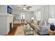 Comfortable living room featuring hardwood floors and a decorative fireplace perfect for relaxing at 1105 Vanizer St, Charlotte, NC 28208