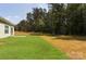Enjoy a serene backyard with well-maintained lawn, great for relaxation and Gathering gatherings at 111 Tradesmen Trl # 75, Troutman, NC 28166
