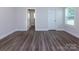 Empty bedroom featuring plush carpeting, neutral walls, and modern trim at 111 Tradesmen Trl # 75, Troutman, NC 28166