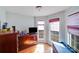 Bright bedroom with hardwood floors, a bay window, and ample natural light at 1232 Pressley Downs Se Dr, Concord, NC 28025