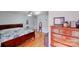 Spacious bedroom with hardwood floors, a ceiling fan, and a cozy atmosphere at 1232 Pressley Downs Se Dr, Concord, NC 28025