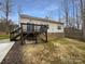Backyard featuring a deck, a patio, and plenty of green space for outdoor enjoyment at 12332 Flatbush Dr, Huntersville, NC 28078