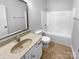 Bathroom featuring tile flooring, a vanity with a sink, a toilet, and a shower/tub combo at 12332 Flatbush Dr, Huntersville, NC 28078