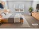 Cozy bedroom featuring a comfortable bed, neutral decor, and a window with natural light at 12332 Flatbush Dr, Huntersville, NC 28078