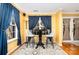 Cozy breakfast nook featuring modern bar stools, natural light from the window, and an open transition to the kitchen at 12421 Poplar Forest Dr, Charlotte, NC 28278