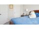 Bedroom features a teddy bear on the bed, bedside table, and white doors at 12461 Bryton Ridge Pkwy, Huntersville, NC 28078