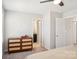 Light-filled bedroom with carpet, ceiling fan, and dresser at 12461 Bryton Ridge Pkwy, Huntersville, NC 28078