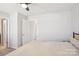 Spacious bedroom with a walk-in closet, neutral walls, carpeted floors, and easy access to an ensuite bathroom at 12461 Bryton Ridge Pkwy, Huntersville, NC 28078