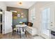 Charming dining area featuring a built-in bench, round table, and stylish decor at 12461 Bryton Ridge Pkwy, Huntersville, NC 28078