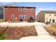 Relax on the backyard patio complete with a built in brick seating area at 12614 Chantrey Way, Huntersville, NC 28078