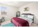 Bright bedroom with a large window, neutral walls, and carpet flooring at 12614 Chantrey Way, Huntersville, NC 28078