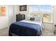 Bedroom with a window, carpet, and a blue comforter on the bed at 12614 Chantrey Way, Huntersville, NC 28078