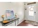 Inviting entryway featuring a decorative table and a glass-paneled front door at 12614 Chantrey Way, Huntersville, NC 28078