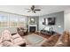 Comfortable living room with fireplace, hardwood floors, and natural light at 12614 Chantrey Way, Huntersville, NC 28078