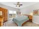 Cozy bedroom with ceiling fan, natural light, and comfortable rug at 1323 Stack Rd, Monroe, NC 28112