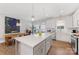 Bright, open floor plan with eat in dining space, stainless steel appliances, and modern fixtures at 1323 Stack Rd, Monroe, NC 28112